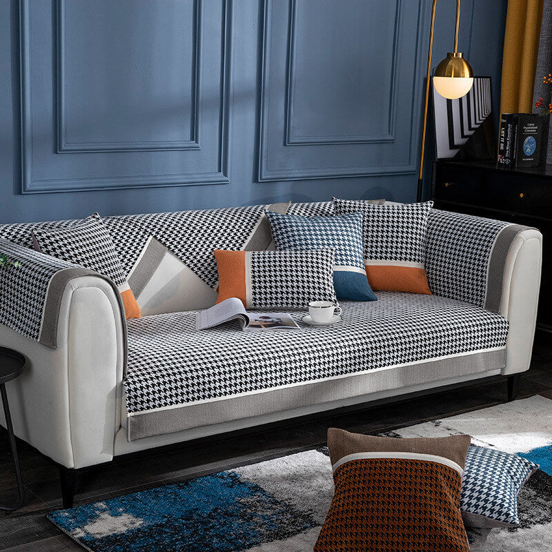 Transform your living room: non-slip houndstooth chenille sofa cover, pet friendly and durable.