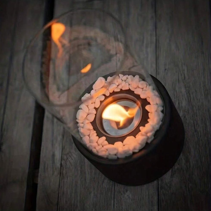 Traditional open flame oil lamp, metal & glass, for timeless ambient decor.