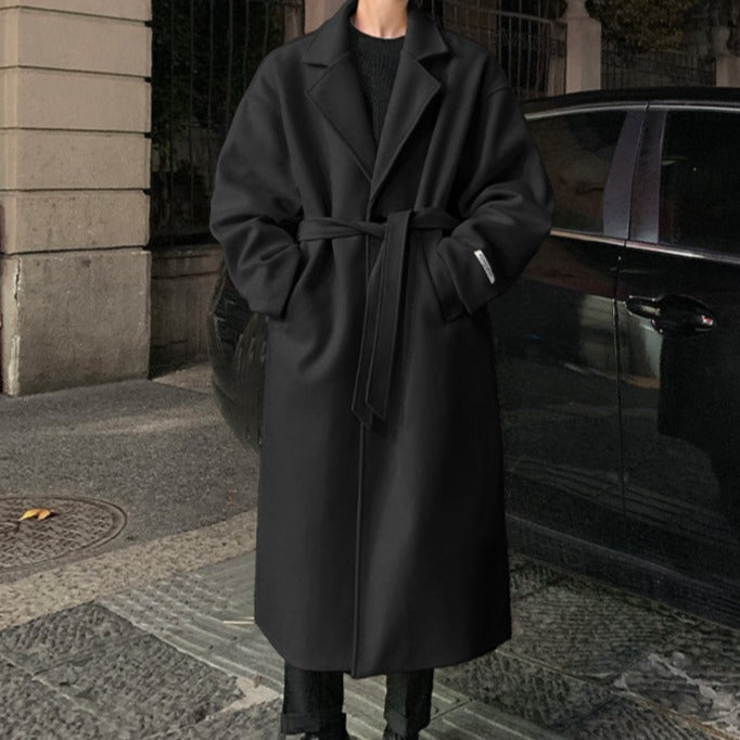 Classic men's long belted trench coat in black, perfect formal outerwear for business & winter fashion.