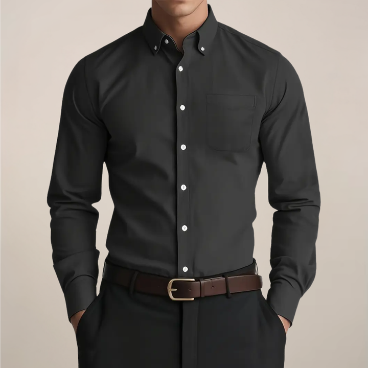 Premium men's long sleeve button-up shirt. Essential for a sophisticated casual outfit or a sharp workwear ensemble.