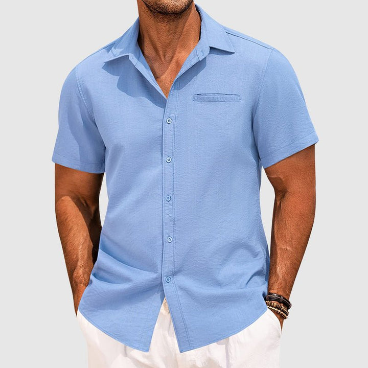 Stylish men's button-down shirt, short sleeve for summer. Features a handy chest pocket. Smart casual wear.