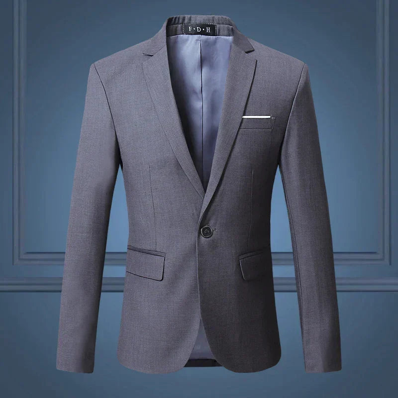 Stylish men's single-breasted blazer. A formal jacket with tailored fit, suitable for work or evening events.