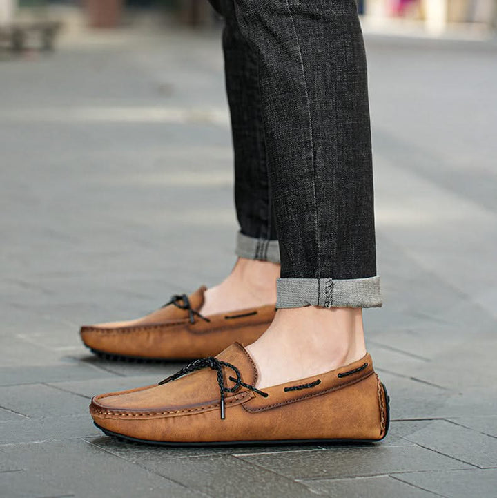 Everyday men's slip-on loafers. Classic, comfortable footwear for casual or smart-casual wear, stylish men's shoes.