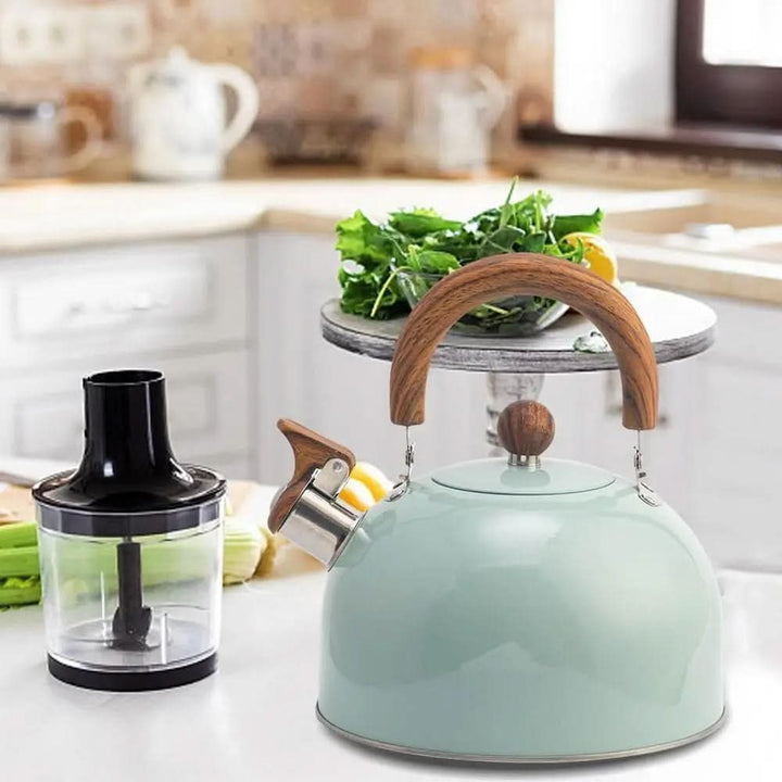 Stovetop 3-quart stainless steel whistling kettle, a kitchen essential for quickly boiling water.
