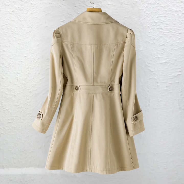 Timeless women's classic trench coat. Fitted, belted, & structured design, ideal for elegant office & everyday outerwear.