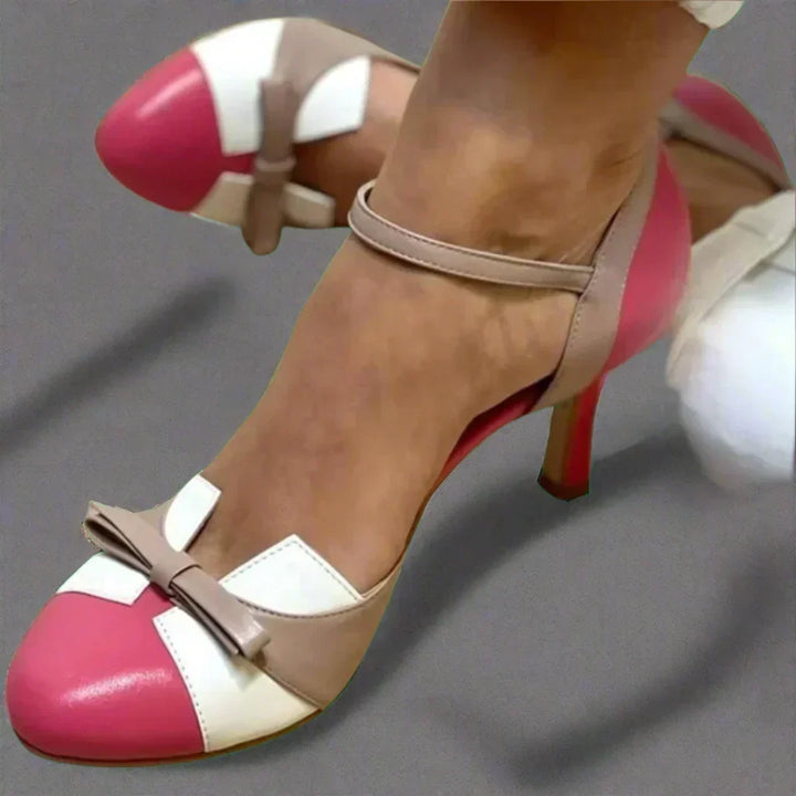 Elegant blue women's mid-heel pumps featuring a chic bow strap, ideal for parties & comfortable all-day wear.