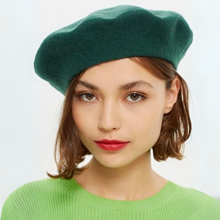 Burgundy women's beret, a rich classic French hat. Ideal for elegant winter outfits.