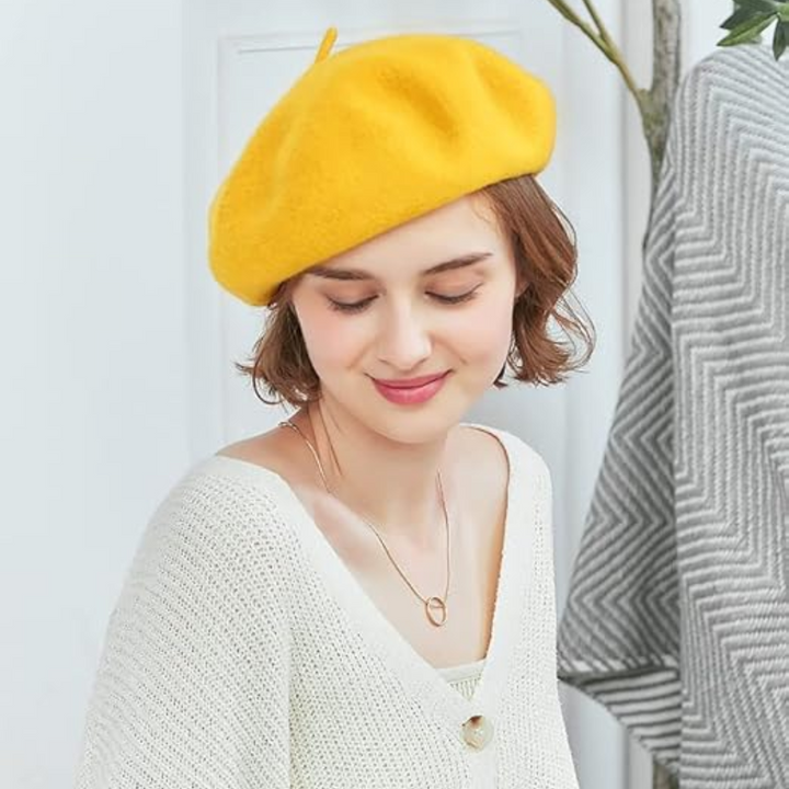 Timeless women's French beret in a classic hue, a must-have fashion accessory.