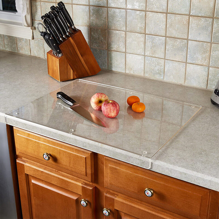 Essential non-slip acrylic cutting board for hygienic food prep, protecting countertops. Clear, durable for home cooking.