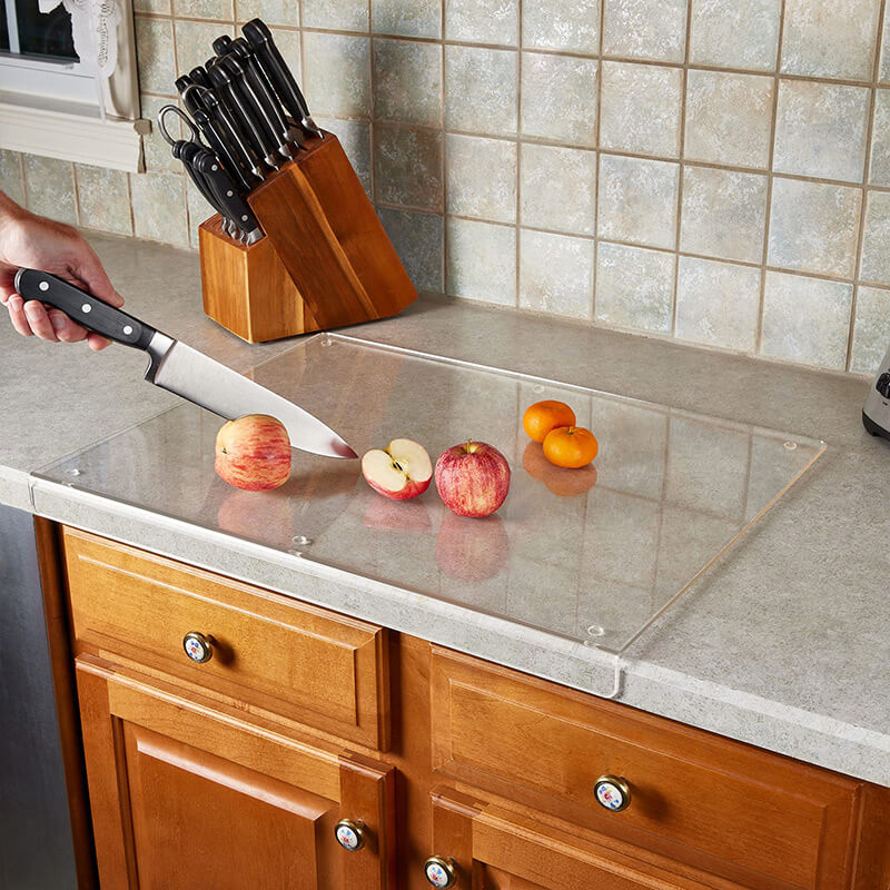 Modern clear acrylic non-slip cutting board by GlassEdge for sleek kitchen prep and stylish food presentation.