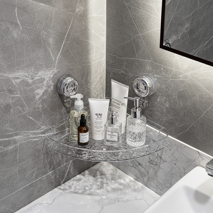 Clear suction cup wall organizer for bathroom storage. Easy no-drill shower caddy for essentials.