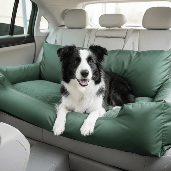Elevated view of a comfortable pet car bolster bed with a dog resting peacefully, ideal for travel.