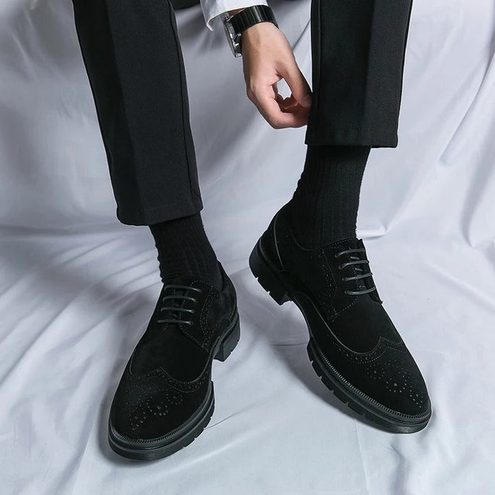 Elegant black suede brogue shoes for men, featuring a comfortable design and classic look.