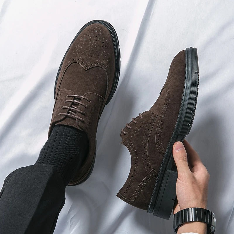 Men's classic brown suede brogue shoes with lace-up detail, comfortable for all-day wear.