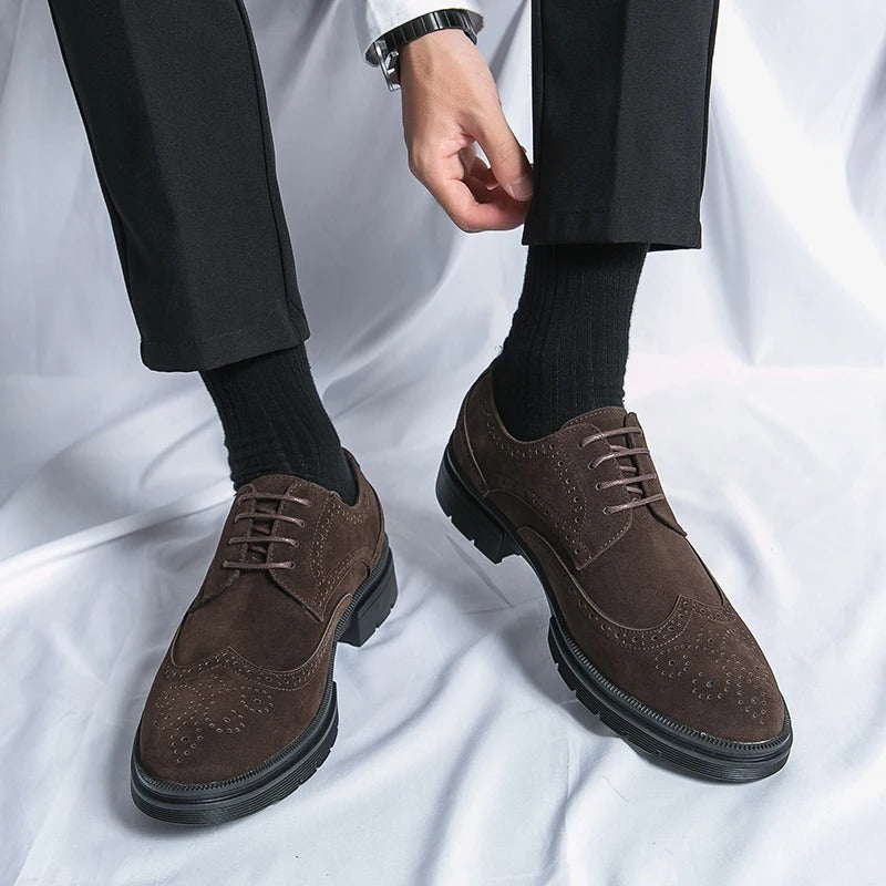 Versatile brown suede brogue footwear, suitable for formal wear or smart casual outfits.