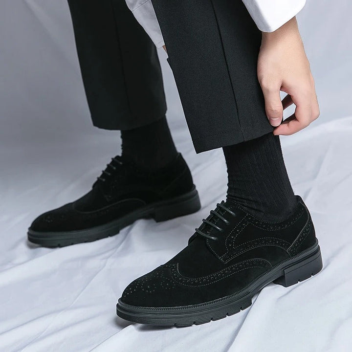 Men's lace-up brown suede brogues, offering a comfortable and sophisticated footwear option.