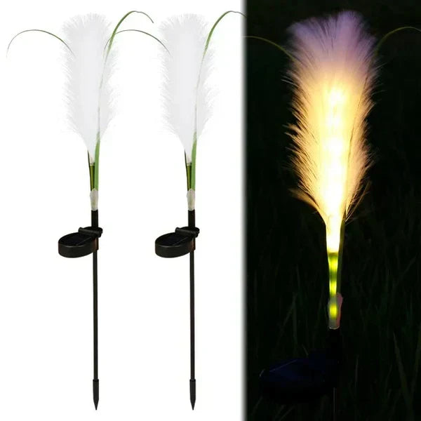 Ambiance lighting provided by unique Reed Garden Lights, enhancing evening garden decor.