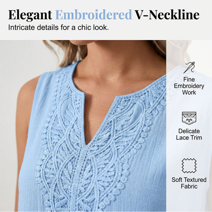 Detail of beautiful embroidery on a V-neck sleeveless casual summer dress.