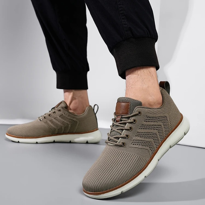 Side view of Men's Airmesh Stride Running Sneakers, highlighting cushioned sole and comfortable design.