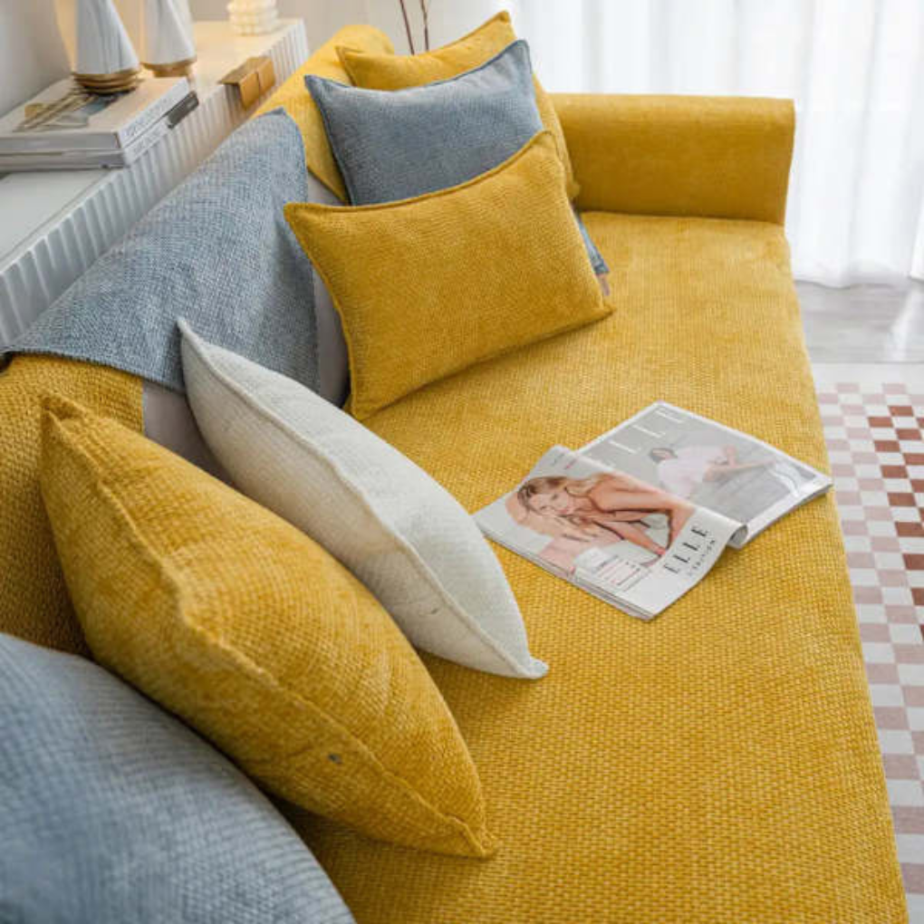 Cloud woven velvet sofa cover in a modern living room, protecting furniture from pets.
