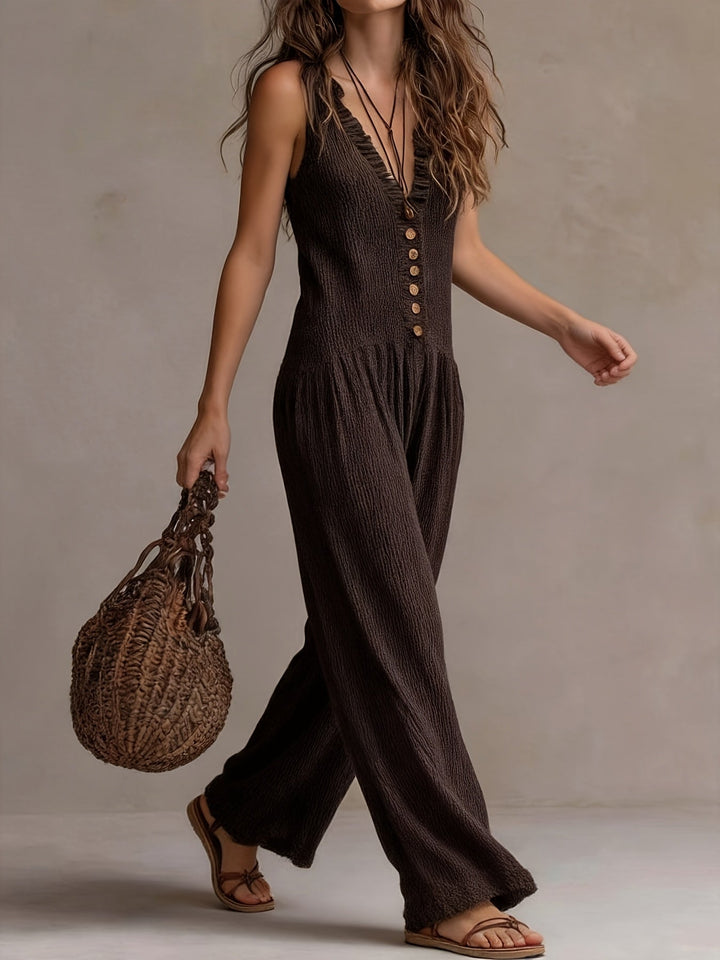 Coffee brown women's wide leg jumpsuit with ruffle V-neck, smocked waist, and button front for summer.
