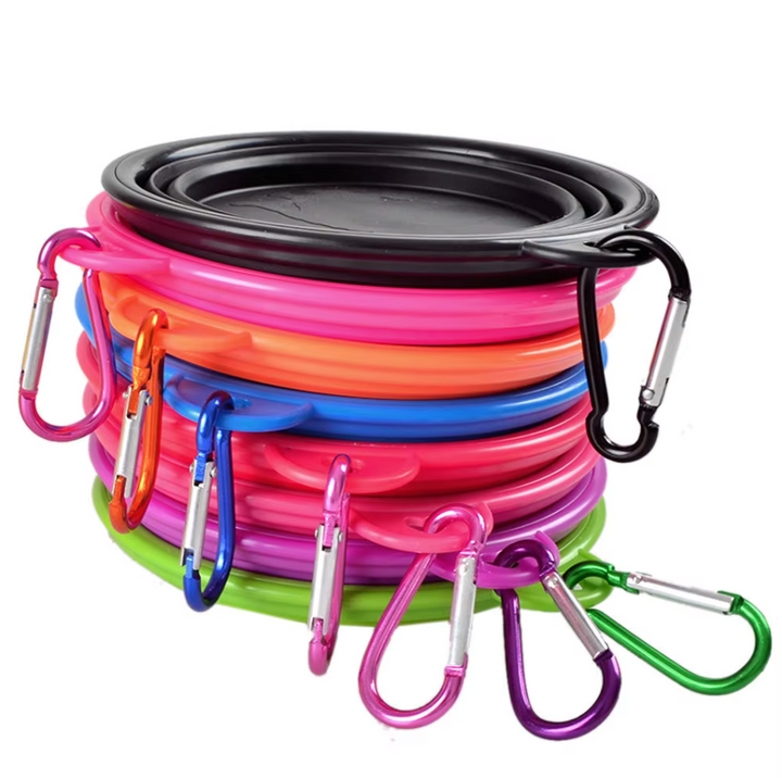 Foldable dog travel accessory: orange silicone bowl with metal carabiner, for food or water