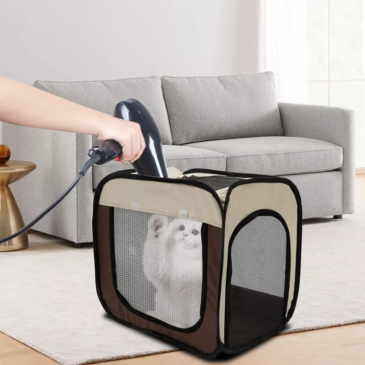 Cat travel carrier, durable and collapsible, designed for safe and comfortable car journeys.