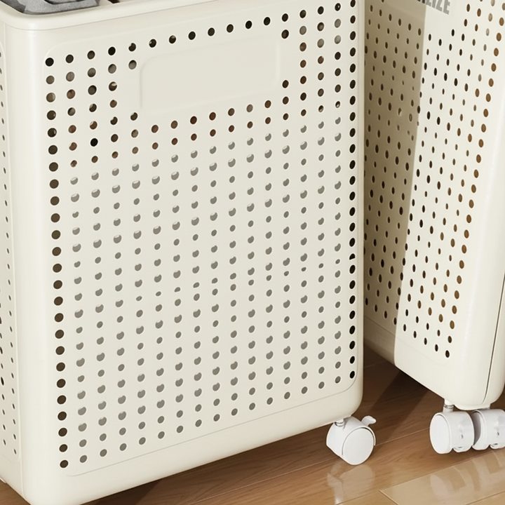 Space-saving collapsible laundry sorter with wheels, white, ideal storage solution for dirty clothes.