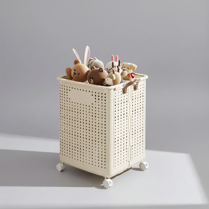 Household storage solution: cream collapsible wheeled laundry basket for easy dirty clothes organization.