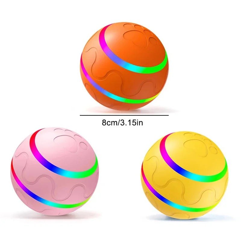 Automatic rolling pet toy ball in action, engaging dog or cat for active play