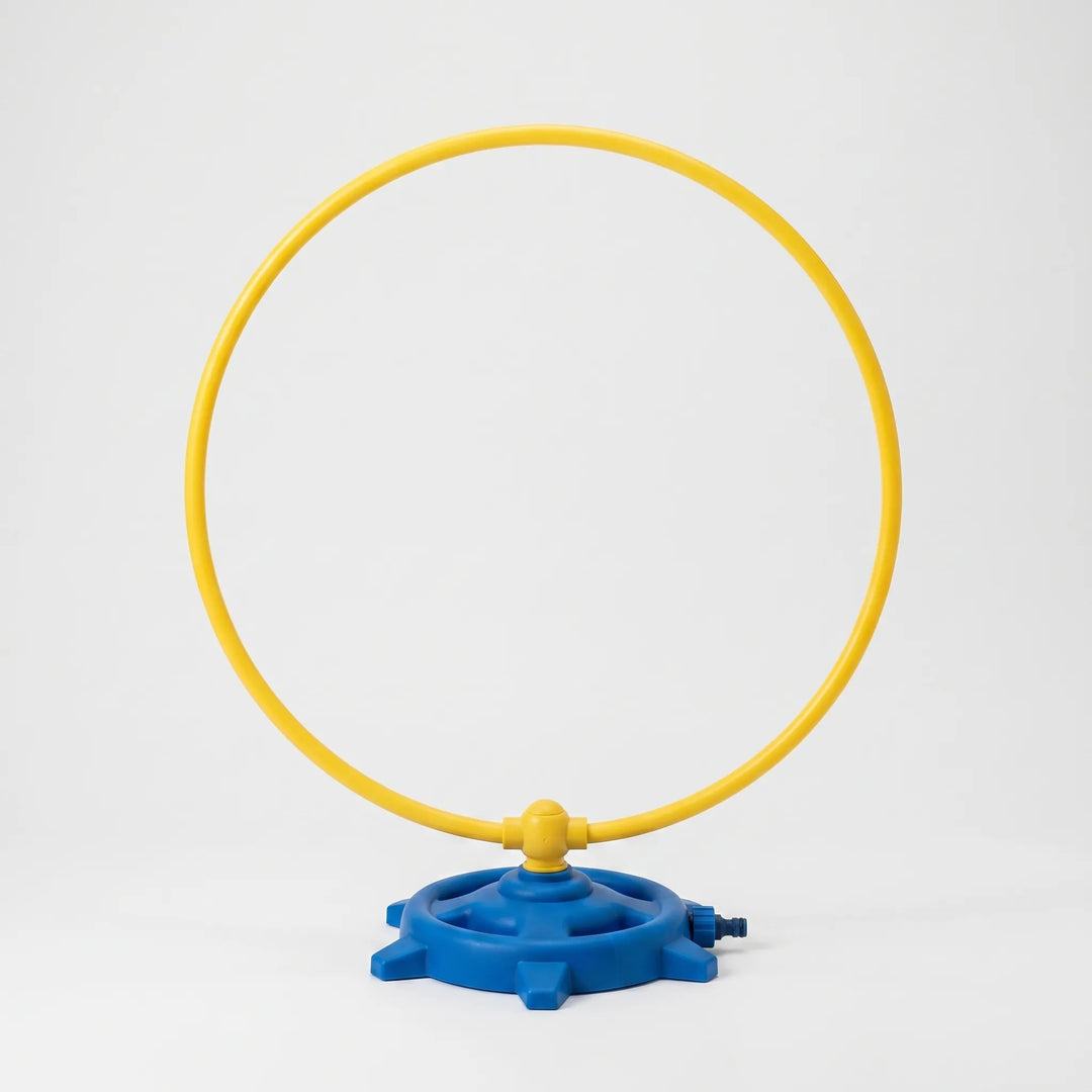 Vibrant rotating play sprinkler, perfect water play equipment for toddlers & kids' outdoor summer splash fun.