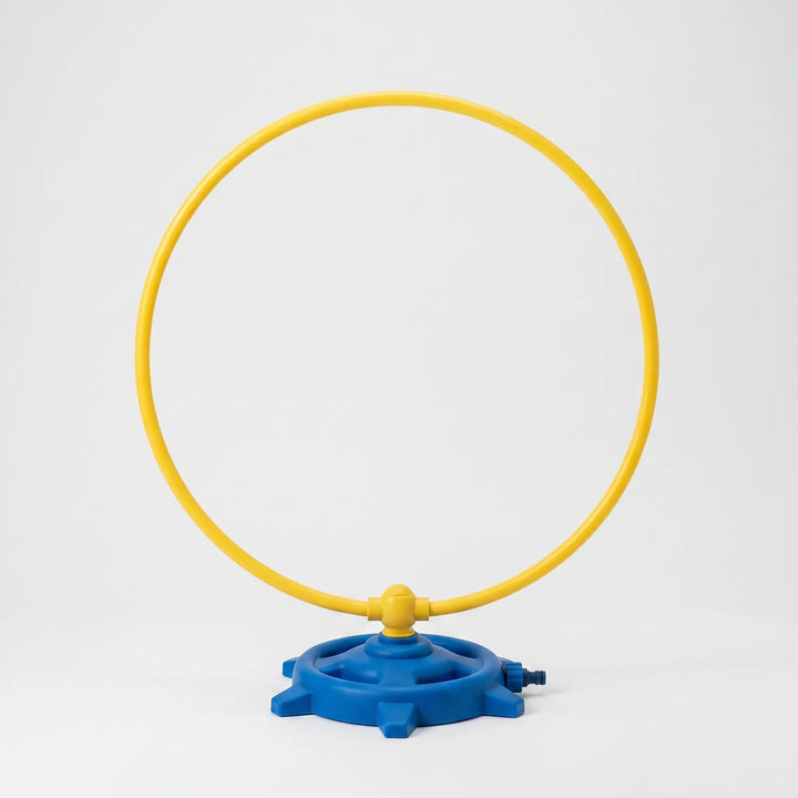 Vibrant rotating play sprinkler, perfect water play equipment for toddlers & kids' outdoor summer splash fun.
