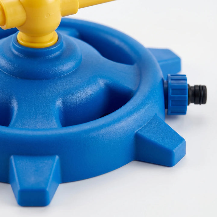 Dynamic rotating lawn water sprinkler, a backyard splash pad alternative for active kids' outdoor summer toy.
