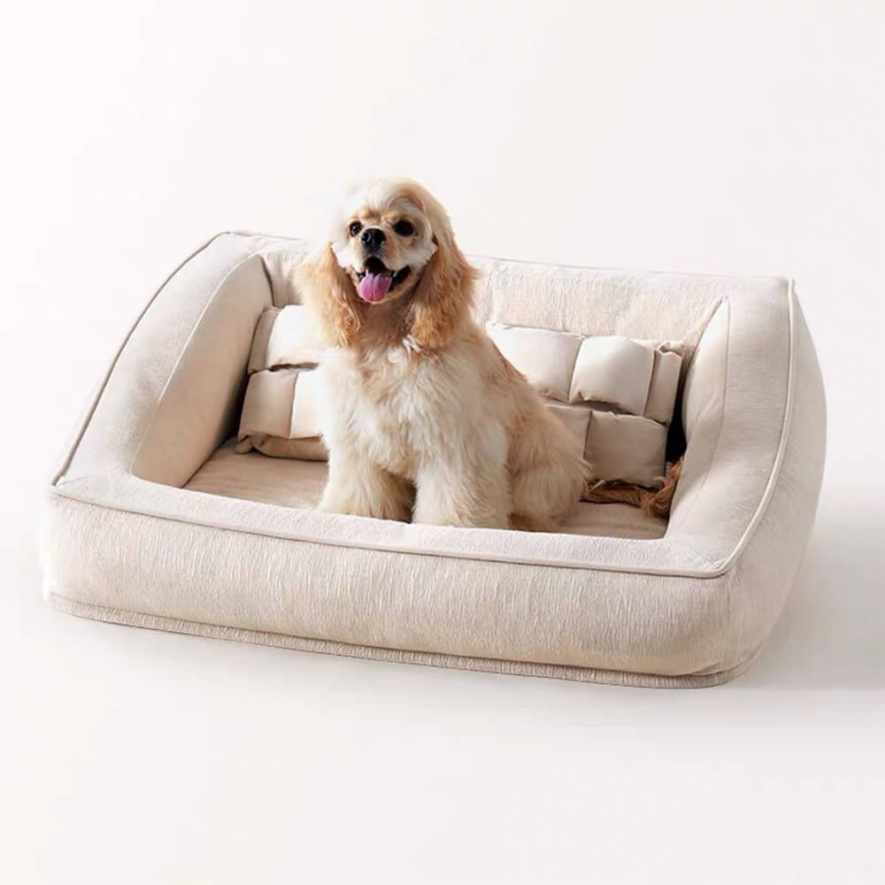High-quality orthopedic pet bed, sofa style with plush pillows, designed for easy washing.