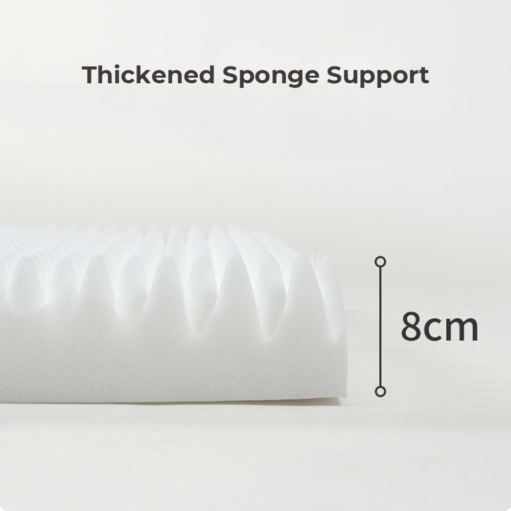 Angled view of the washable pet sofa bed, orthopedic foam support & soft, matching pillows.