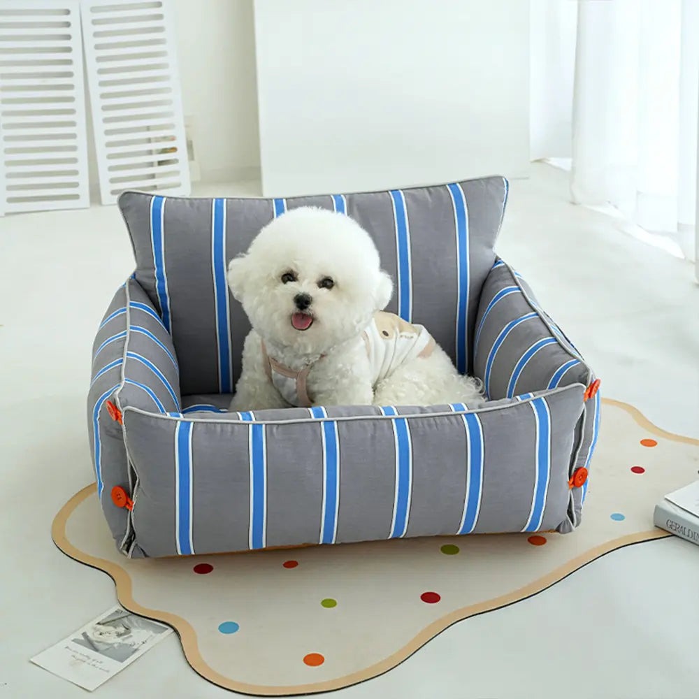 Comfortable grey pet sofa bed with raised edges, ideal for small to medium dogs, washable dog bed.