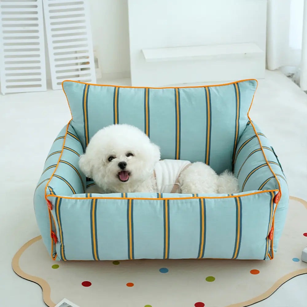 Plush pet sofa bed with supportive raised sides, providing comfort for dogs, durable pet furniture.