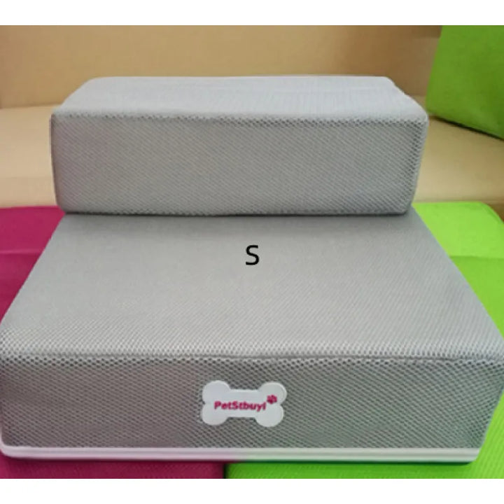 Pet stairs alongside a sofa, showing how it aids small dogs in reaching the cushion