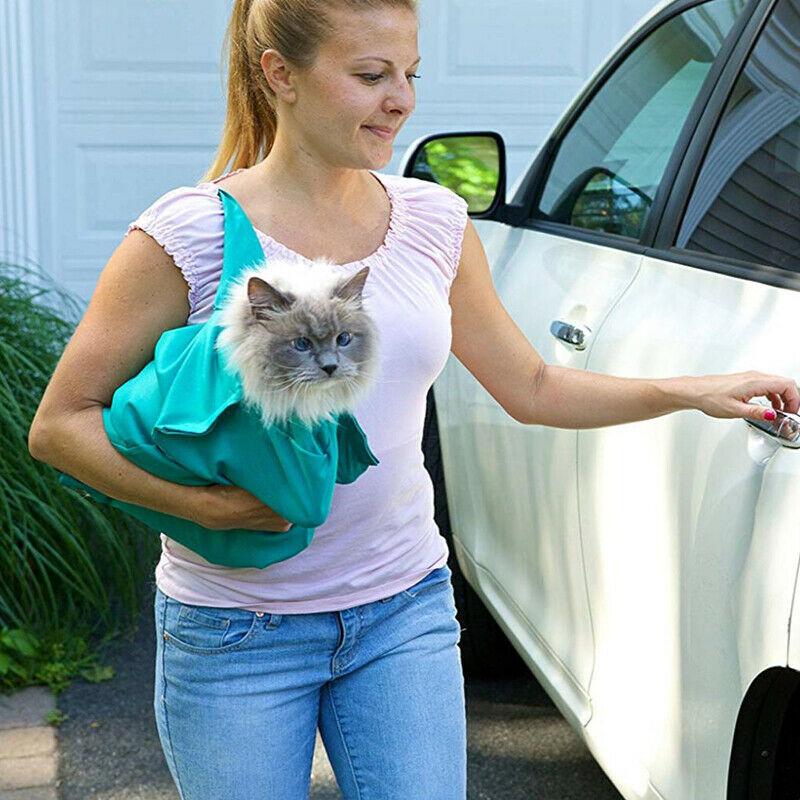 Breathable cat travel bag in gray, ideal for pet transport and airline travel compliance