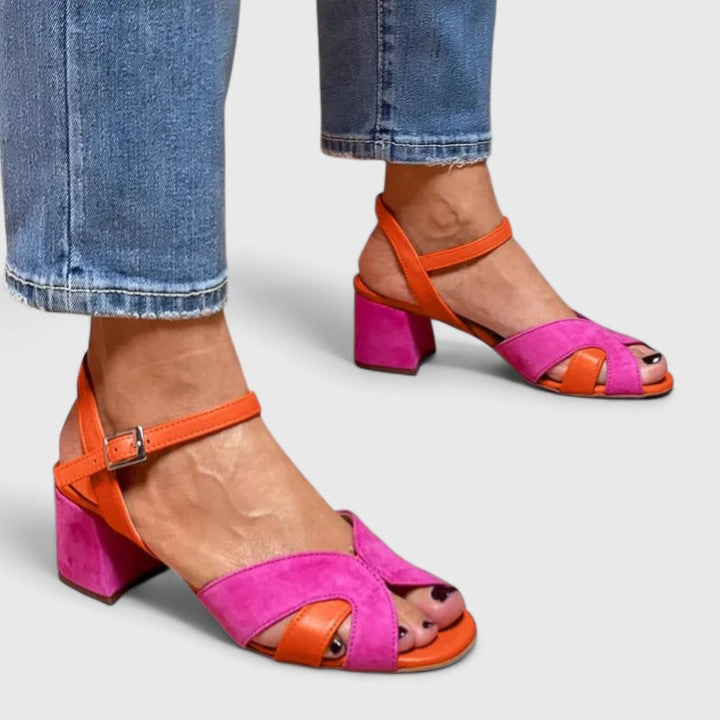 Comfortable pink wedge heel sandals for women, perfect for summer casual wear. Features an adjustable strap.