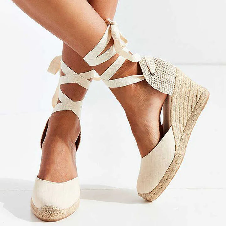 Comfortable women's chic ankle strap sandals for summer. Versatile open-toe flat design perfect for casual or elegant wear.