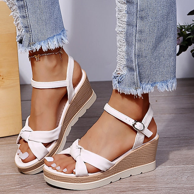 Comfortable women's platform wedge sandals with ankle strap, perfect for summer casual wear.