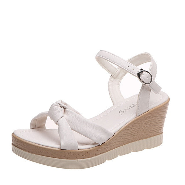 Everyday women's platform wedge sandals, comfortable ankle strap design for versatile summer outfits.