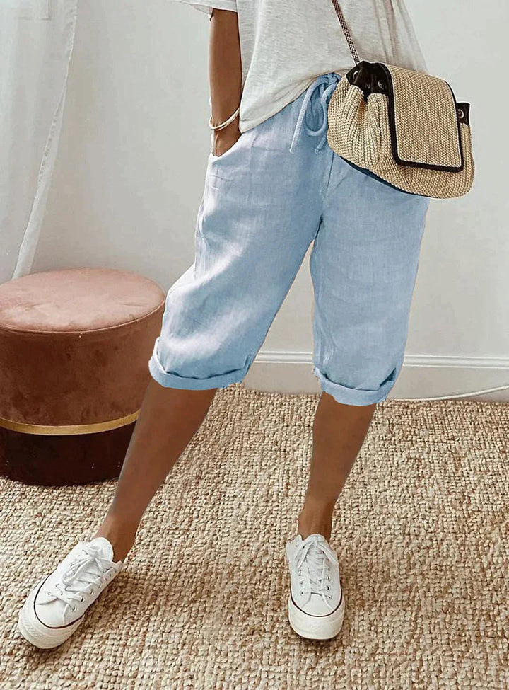 Chic women's polyester capri pants, versatile summer bottoms with a comfortable elastic waist. Lightweight fashion.