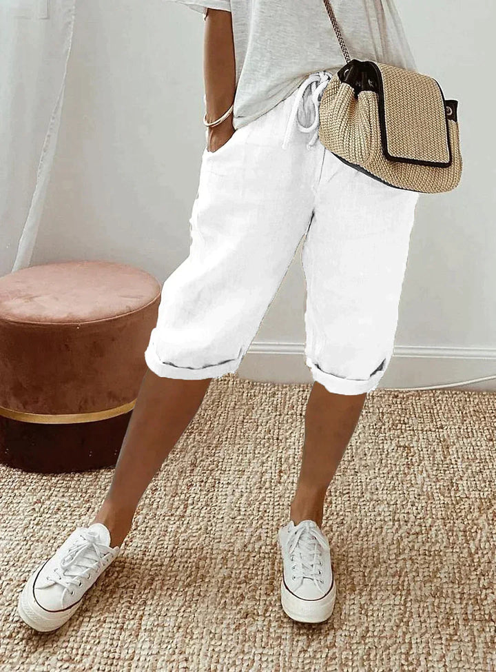 Lightweight women's polyester capri pants with an elastic waist for ultimate comfort. Stylish casual summer bottoms.