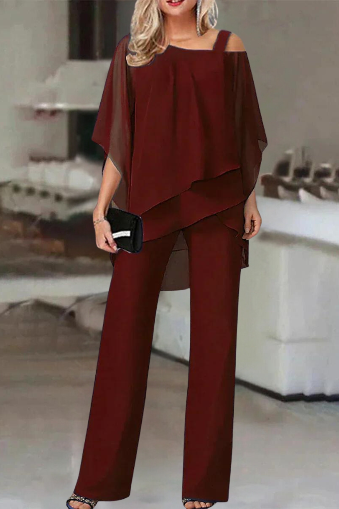 Versatile women's fashion two-piece set, featuring a stylish blouse and comfortable pants for various occasions.