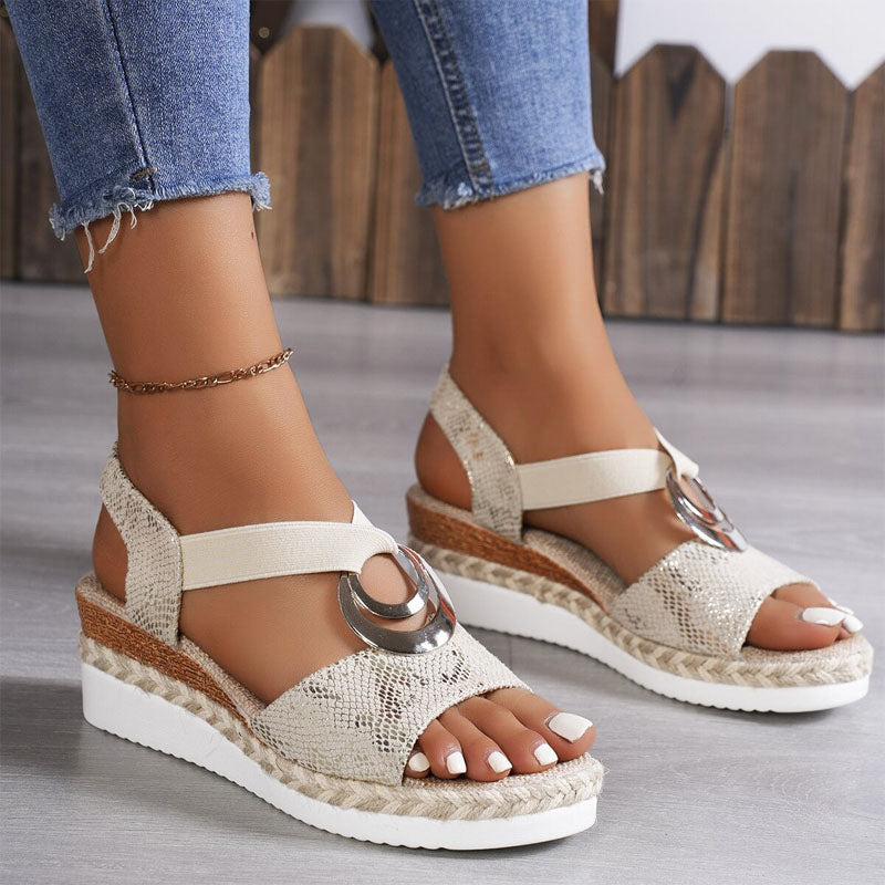 Women's open-toe wedge sandals featuring elastic strappy design & platform for comfortable summer footwear.