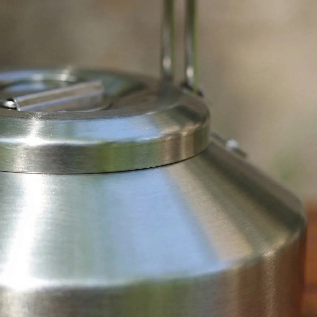 Portable 3-piece camping cookware set: lightweight pot, pan, and kettle for outdoor cooking & hiking meals.
