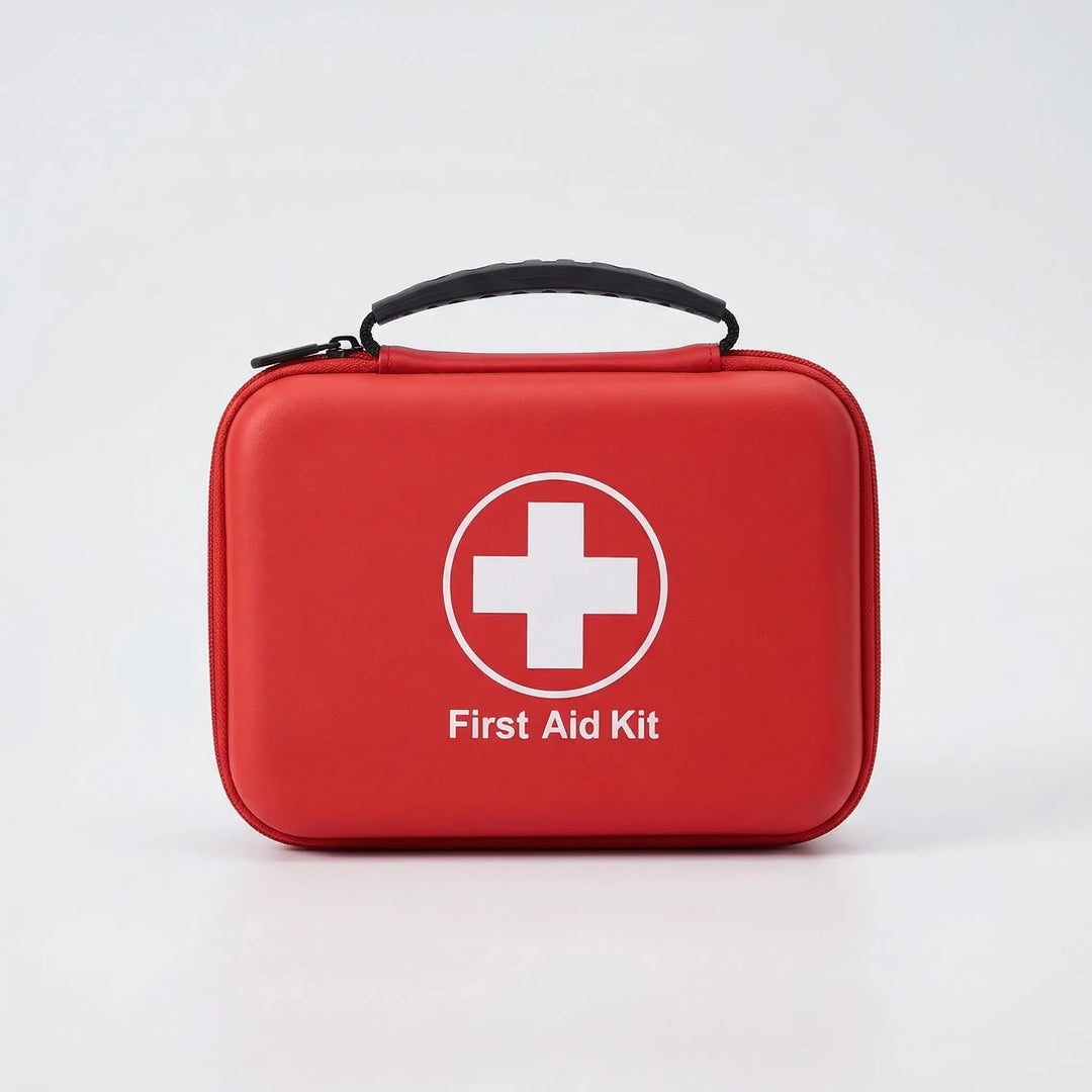 Open 38-piece emergency first aid kit displaying essential medical supplies for camping, hiking, and home preparedness.