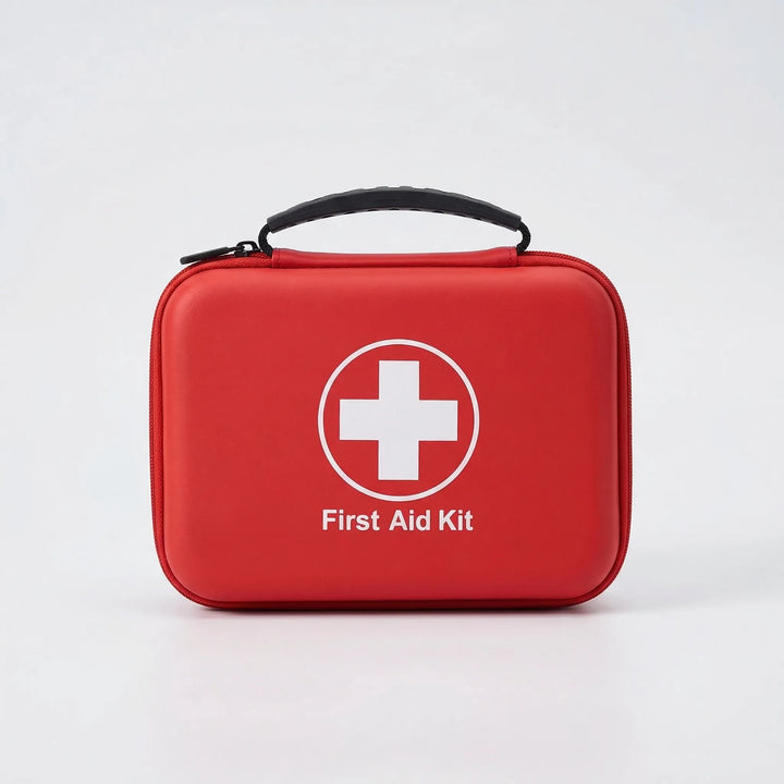 Open 38-piece emergency first aid kit displaying essential medical supplies for camping, hiking, and home preparedness.
